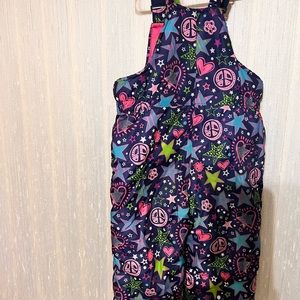 Girl toddler Snow Bib. Water resistant. Light wear and is in good condition.